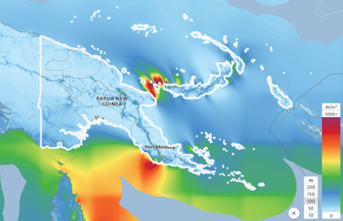 Map of Papua New Guinea with wind power density, (in W/m^2 at 100 meters), mapped on top. While most of PNG's land area has relatively low wind potential, there is significant offshore potential, particularly near Umboi Island where estimates top 1,200 W/m^2.
